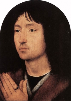 An Unknown Man in Prayer by Hans Memling