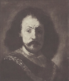 Bust of a man wearing a gold chain by Rembrandt