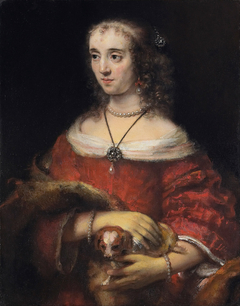 Portrait of a woman with a lap dog by Rembrandt