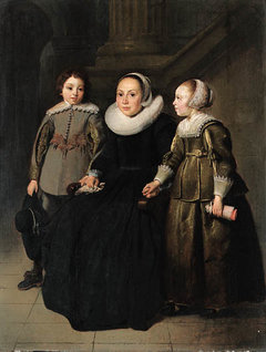 Portrait of a seated woman and two children by Thomas de Keyser