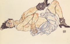 Reclining female nude by Egon Schiele