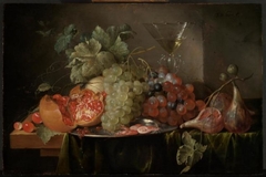 Still life of fruit with a wine glass by Jan Davidsz. de Heem