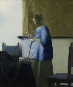 Woman Reading a Letter by Johannes Vermeer