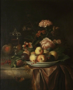 A Dish of Peaches and Plums on a Marble Table with Flowers and a Glass Chalice by Jakob Bogdani