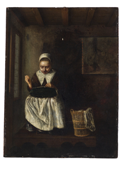 A Girl Sewing by Nicolaes Maes