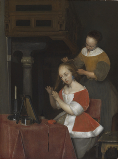 Interior with a young woman and her servant combing her hair by Gerard ter Borch