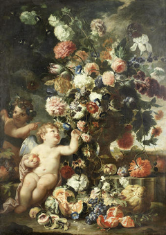 Roses, carnations, tulips and other flowers in a carved stone vase with putti on a stone ledge with split melons, grapes, peaches and other fruit by Franz Werner Tamm