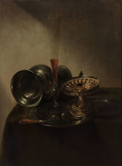 Still life with lying jar, flute-glass and tazza by Jan Jansz den Uyl