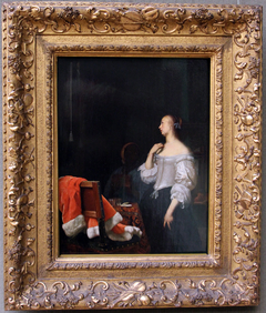 Woman before a Mirror by Frans van Mieris the Elder