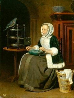 A Lady Sewing, with a Parrot by Gabriël Metsu