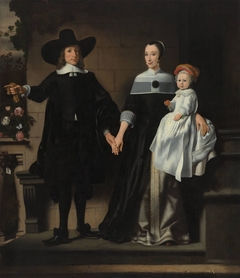 Portrait of a married couple with child by Nicolaes Maes