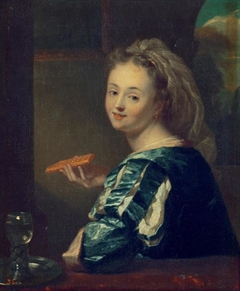 Young woman with a waffle by Godfried Schalcken