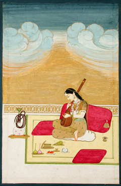 A lady seated against a bolster, playing the tambura by Anonymous