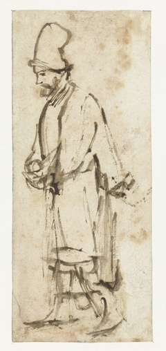 Lopende man met hoge muts by Rembrandt