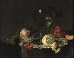 Still Life with rummer, dish and rose by Simon Luttichuys