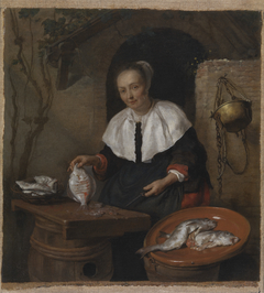 Woman cleaning fish by Gabriël Metsu