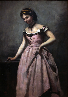 Young woman in pink dress by Jean-Baptiste-Camille Corot