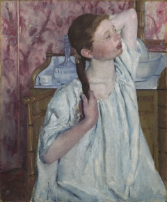 Girl Arranging Her Hair by Mary Cassatt