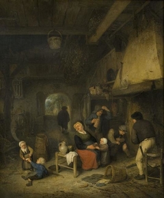 Peasant Family by the Fireside by Adriaen van Ostade