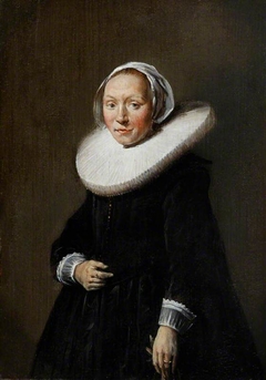 Portrait of a Woman in Black and a Large Cartwheel Ruff, Holding a Glove by Hendrik Gerritsz Pot