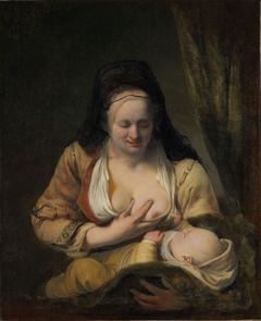 Woman suckling an infant by Ferdinand Bol