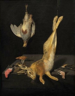 Hunting still-life with hanging hare and birds by Jan Vonck