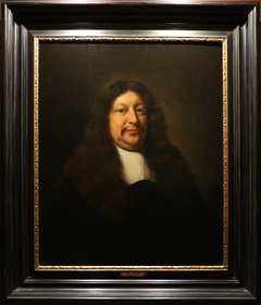 Portrait of Jan van Royen in black velvet, with a large brown wig by Nicolaes Maes