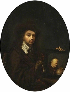 Rembrandt holding a portrait of his father by Gerrit Dou