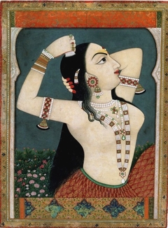 A lady combing her hair by Sahib Ram