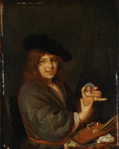 Portrait of a painter, with a miniature of the artist by Adriaen van der Werff