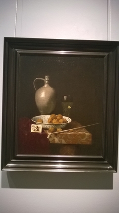 Still life with a pipe nuts and tobacco by Hubert van Ravesteyn