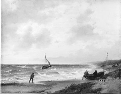 Vissers halen een boot op het strand by Andreas Schelfhout