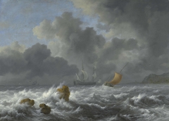 Sailing vessels in a stormy sea near a rocky coast by Jacob van Ruisdael