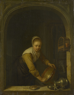 A Maidservant Scouring a Brass Pan at a Window by Gerrit Dou