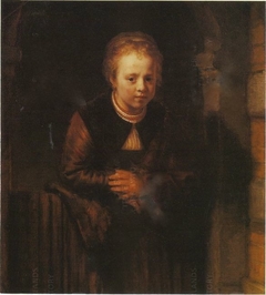 Girl at a half-open door by Rembrandt