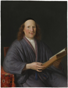 Portrait of a Man Reading a Book by Pieter Cornelisz van Slingelandt